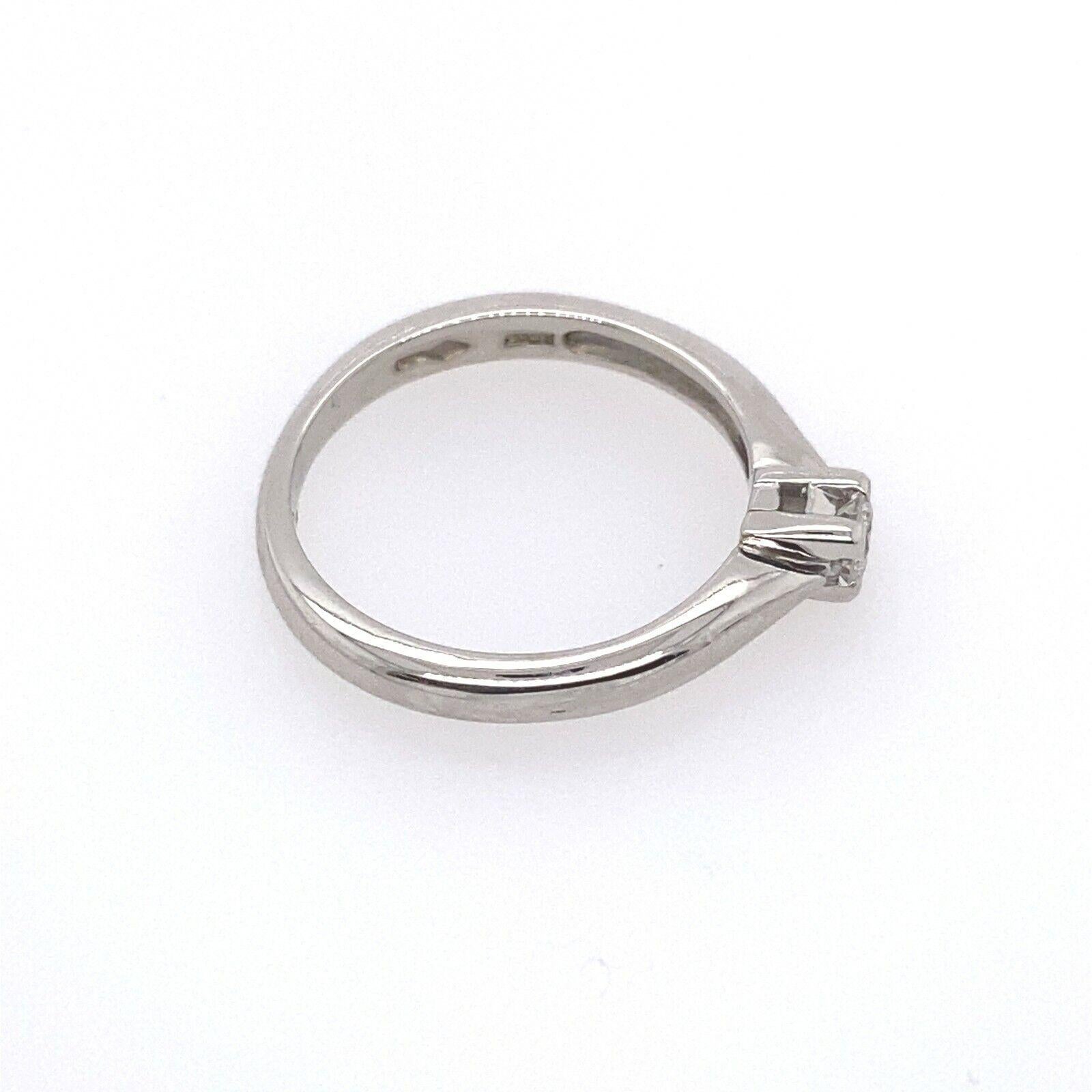 Round Cut Platinum Solitaire Diamond Ring Set with 0.10ct Round Brilliant Diamond For Sale