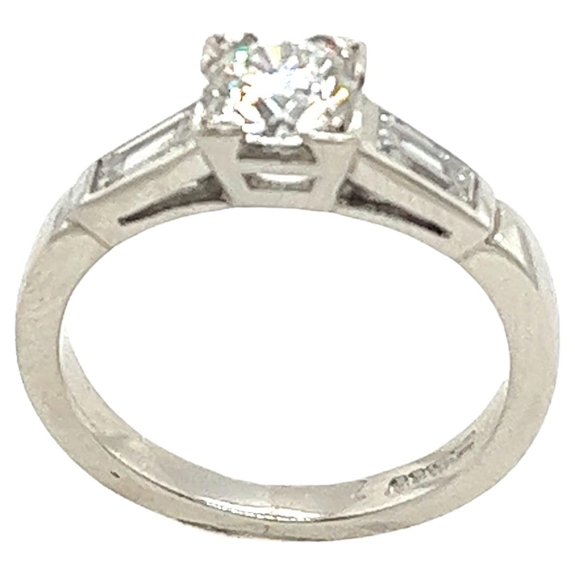 Anillo de diamantes solitario en platino engastado con un diamante de 0,58 ct G/SI1