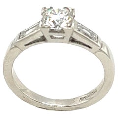 Anello con diamante solitario in platino con diamante G/SI1 da 0,58 carati
