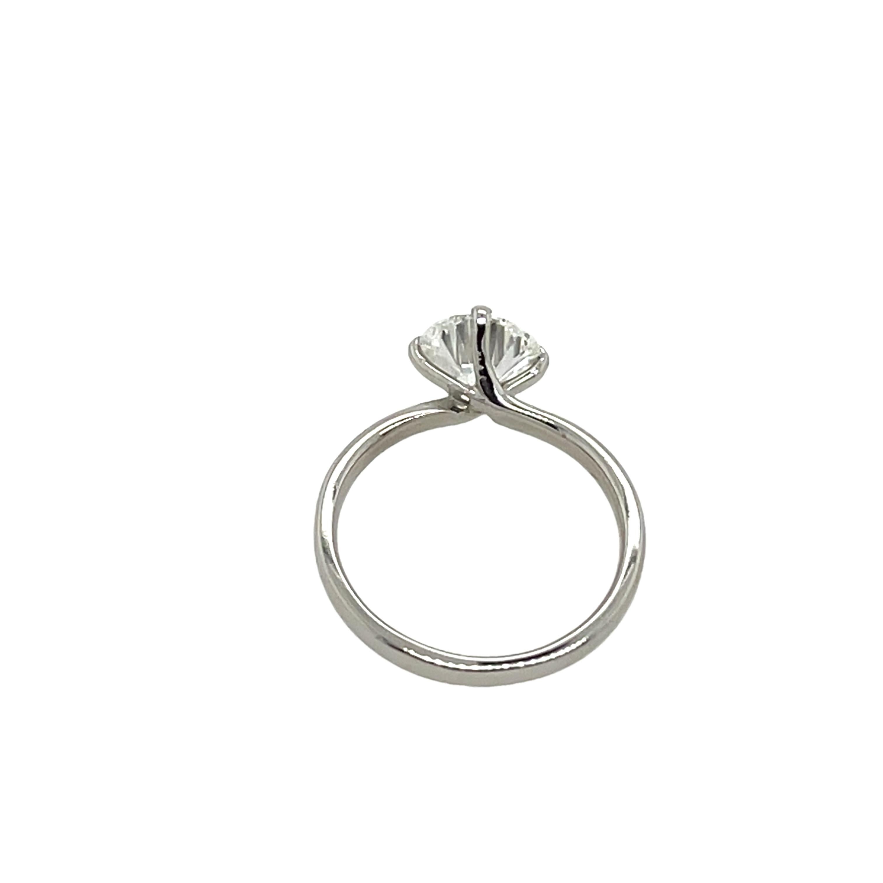 An elegant diamond ring for your engagement, 
set with 1.30ct G colour and SI1 clarity 
natural round cut diamond in platinum setting.
A beautiful and elegant choice for an engagement ring or a special occasion.

Total Diamond Weight: 1.30ct
Diamond