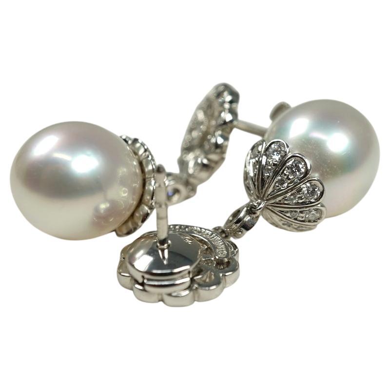 So Lovely! 
In platinum, these beautiful drop earrings are classics from Tiffany & Co.  The pearls measure approximately 11.47 mm in length x approximately 14.95 mm in width. 