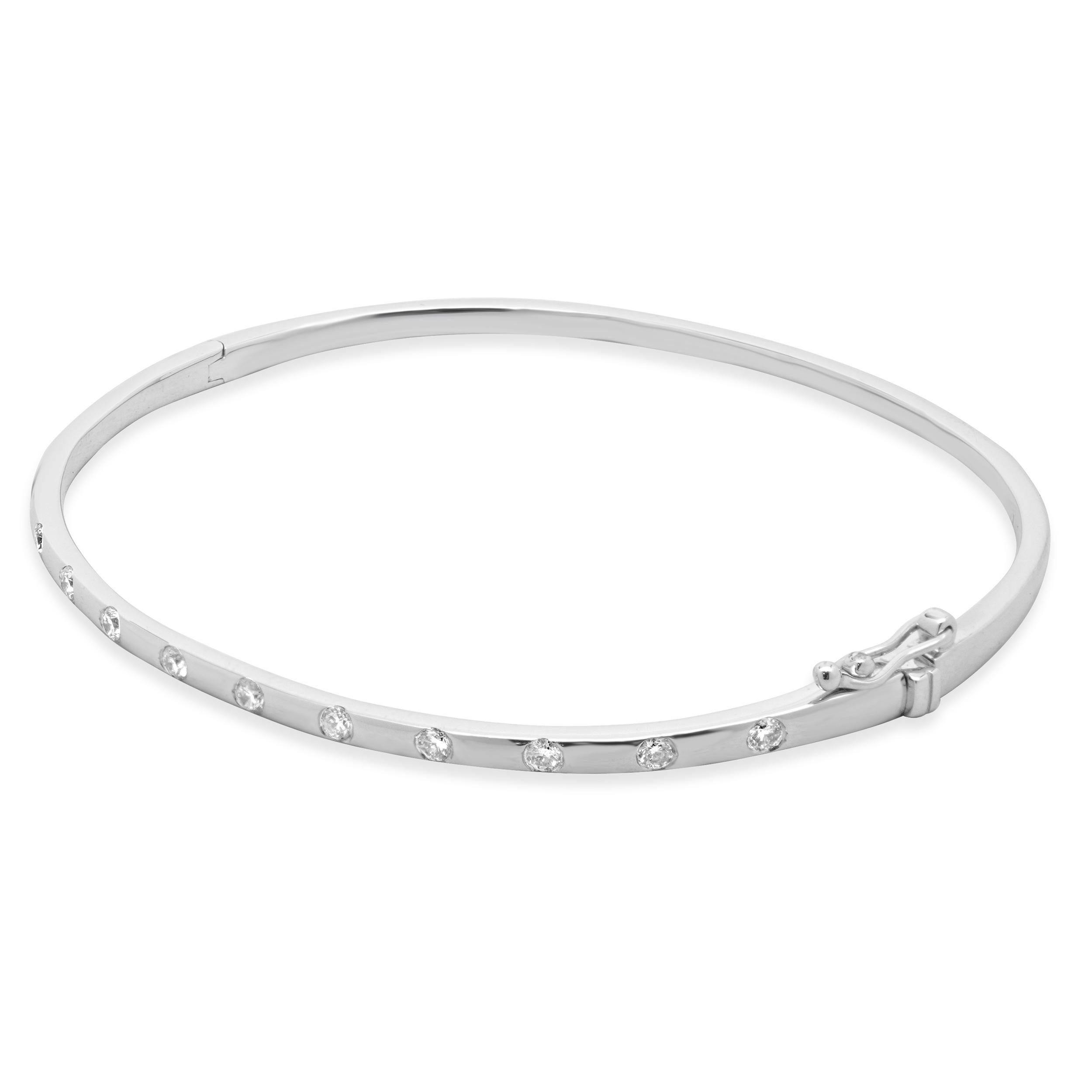 Designer: custom design
Material: platinum
Diamond: 13 round brilliant cut = 0.51cttw
Color: G
Clarity: VS
Dimensions: bracelet will fit approximately up to a 6.5-inch wrist
Weight: 14.60 grams
