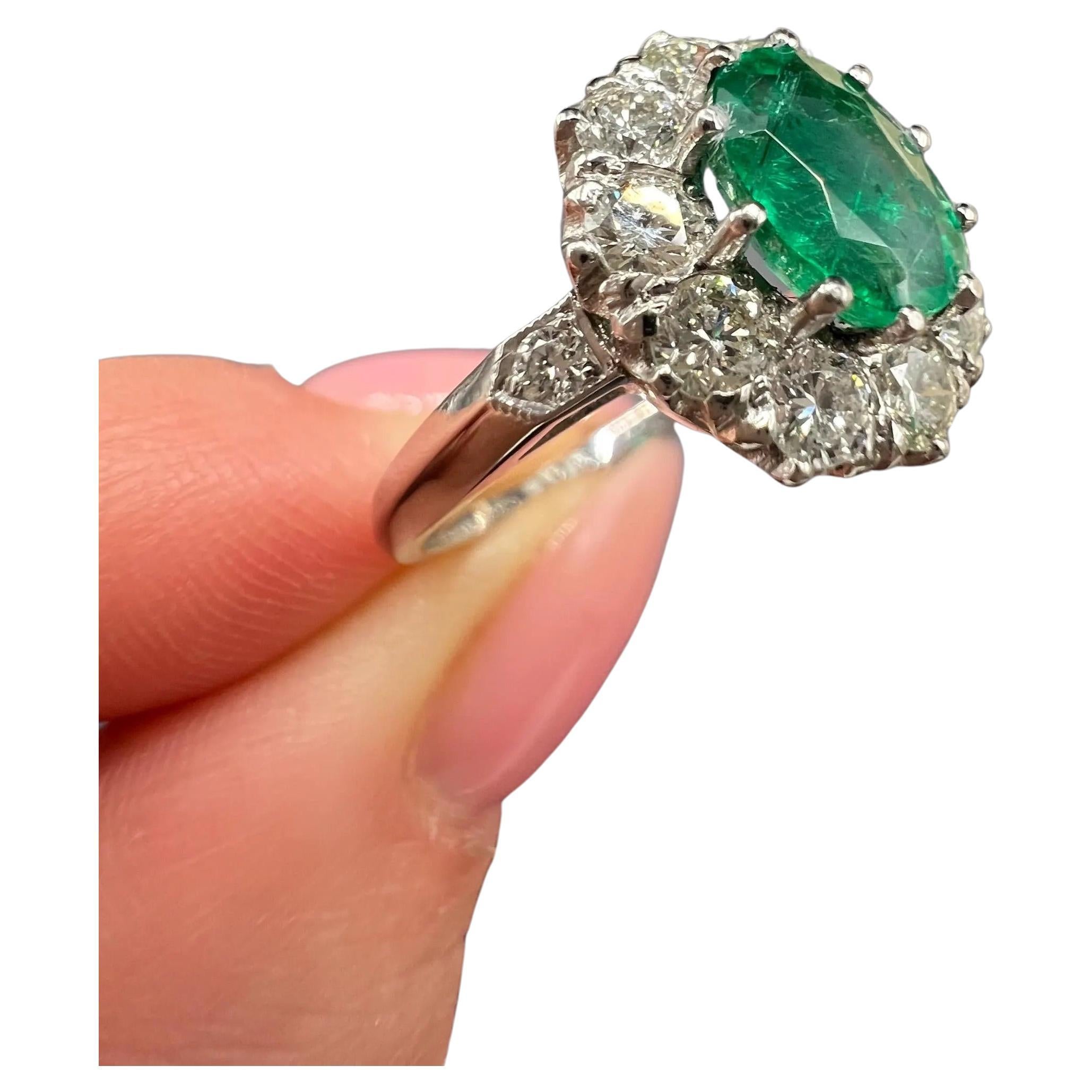 Platinum Stamped, Edwardian Style Emerald 
Diamond Oval Cluster Ring