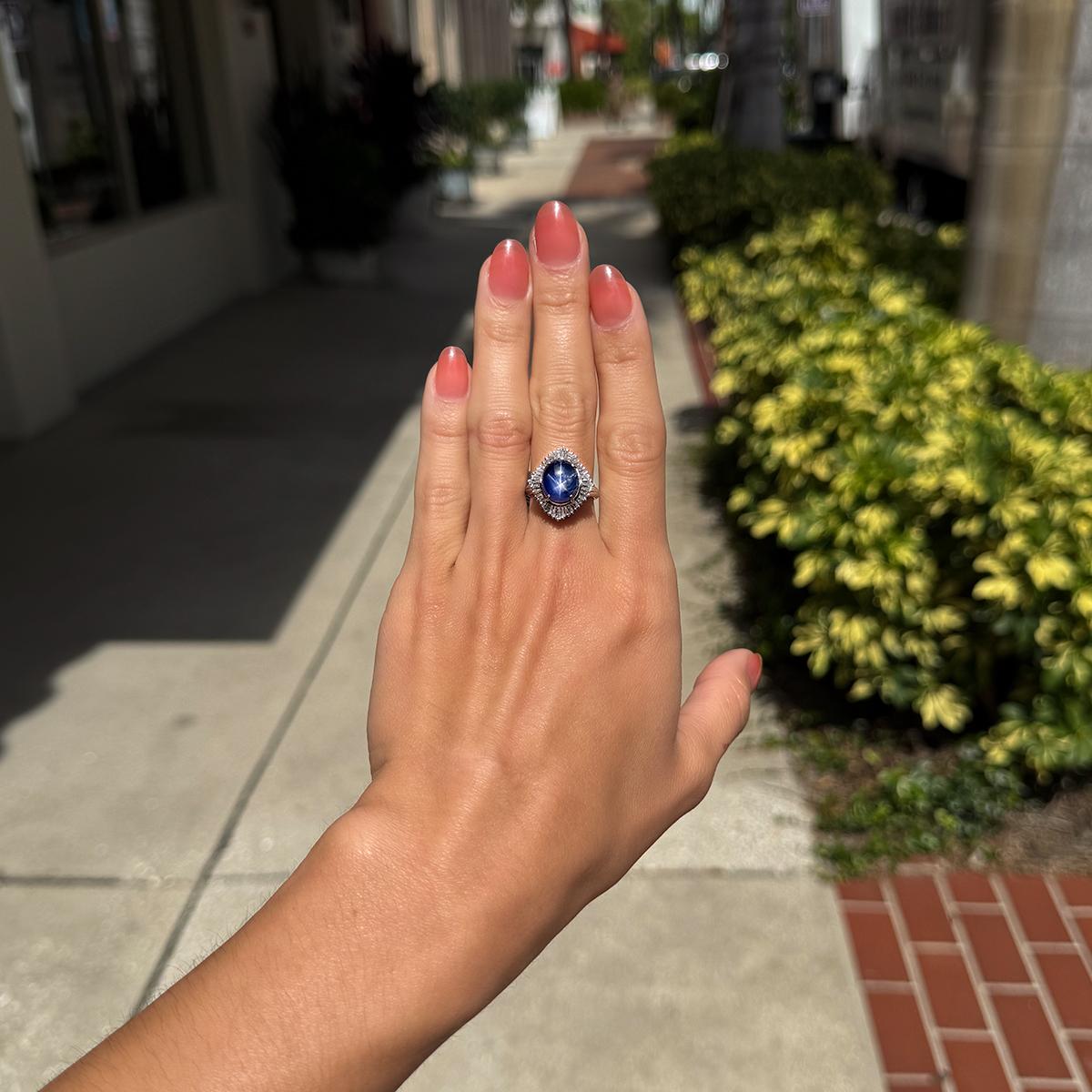This stunning ring features a brilliant star sapphire that shimmers and catches the light, making it a perfect addition to any jewelry collection. With its elegant design and high-quality platinum, this ring is sure to make a statement and add a