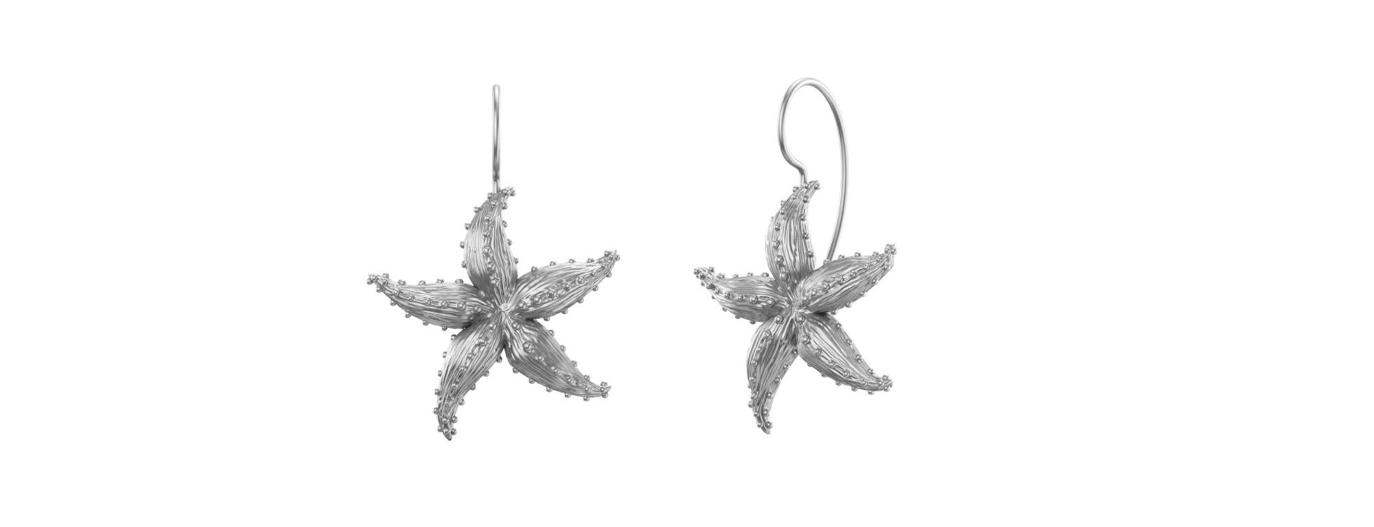 Platinum Starfish  Earrings, The Ocean series.  Summer or winter depending where you live, for the beach lovers. Inspired from sea creatures, with their great shapes and colors. Matte finished. 
These stars are 25 mm tall plus the hook.  These are