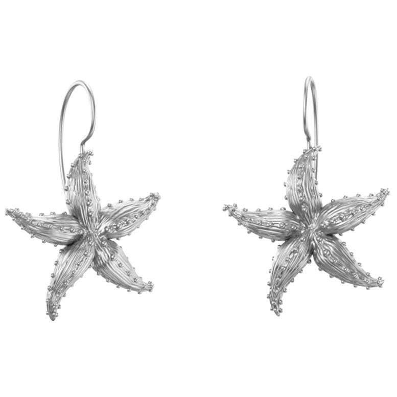 Boucles d'oreilles étoile de mer platine en vente