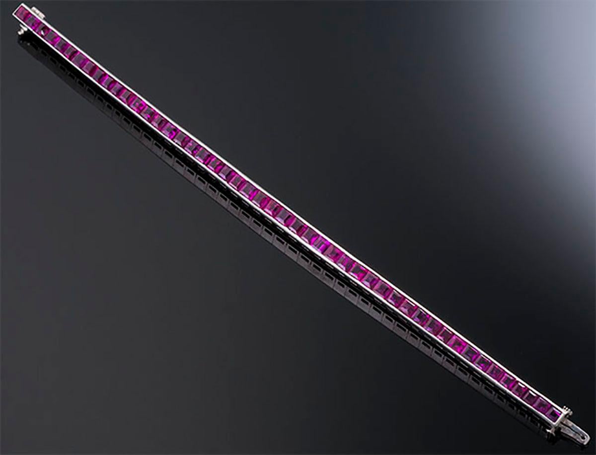 Platinum Art Deco Straight-line bracelet with 52 No Heat Burma rubies weighing approximately 11.50 carats. 21.37g