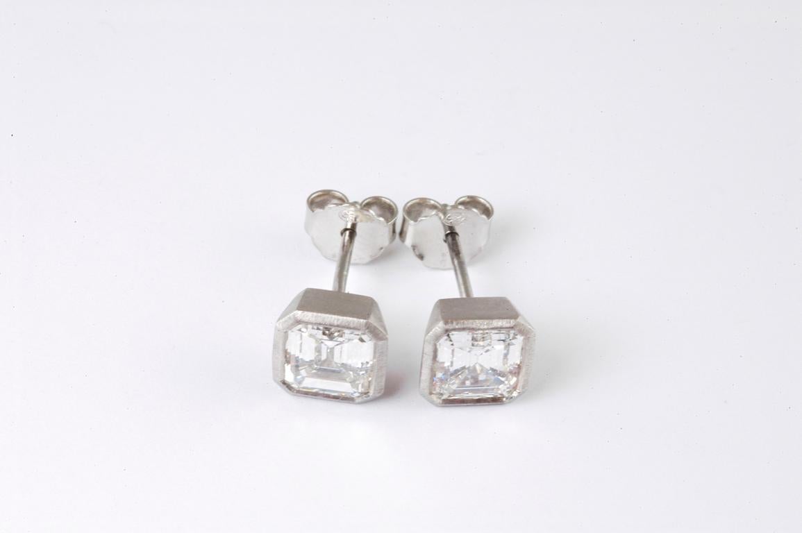Platinum stud earrings with antique ascher cut diamonds 2.38cts  handmade in Notting Hill, London by renowned British jewellery designer Malcolm Betts.
Comfortable enough for every day wear, yet easily dressed up when worn with a platinum necklace