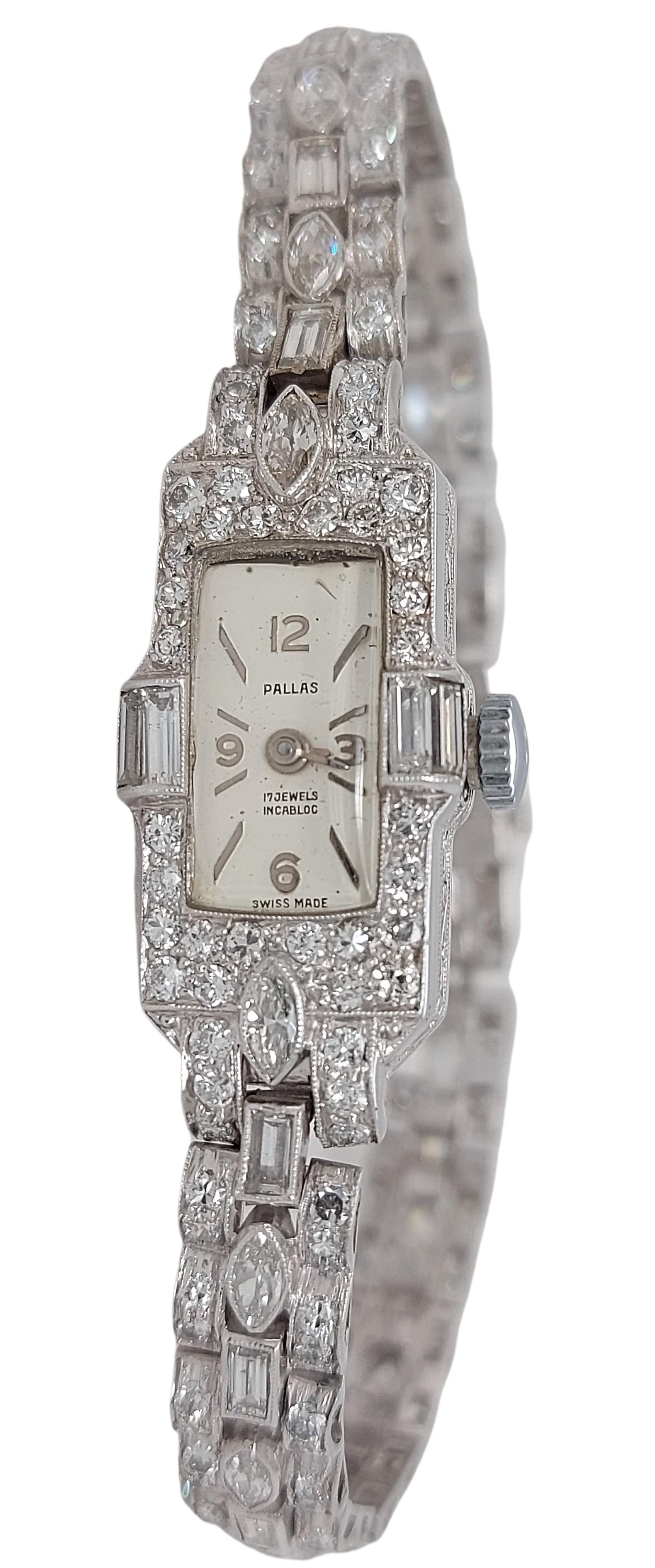 Platinum Stunning Pallas Diamond Tennis Bracelet Watch 

Material: Platinum

Case: Platinum Measurements: 15.3 mm (with crown) x 26.4 mm, Thickness 6.6mm, 17 Jewels 

Dial: Silvery / White dial with Roman numerals by the 3, 6, 9, 12

Strap: Platinum