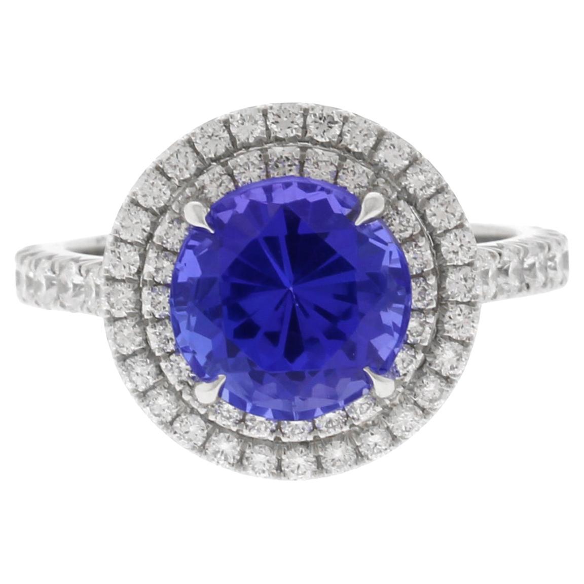 Platinum Tanzanite and  Double Diamond Halo Ring by Pampillonia