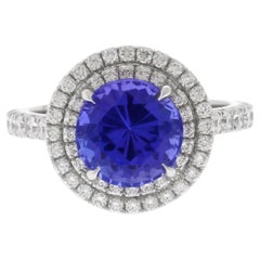 Platinum Tanzanite and  Double Diamond Halo Ring by Pampillonia