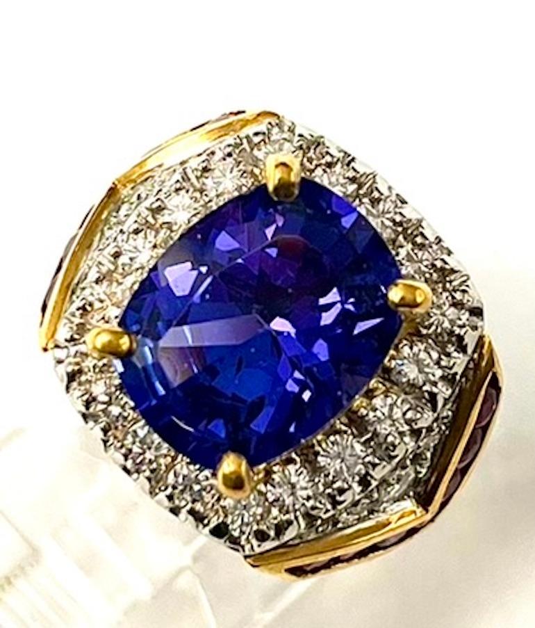 This is an artistic and truly unique ring.  This large Tanzanite which weighs 6.25Ct  is very deep and saturated in color and is also quite transparent. The addition of rubies to the design adds a creative element that blends seamlessly. This is a