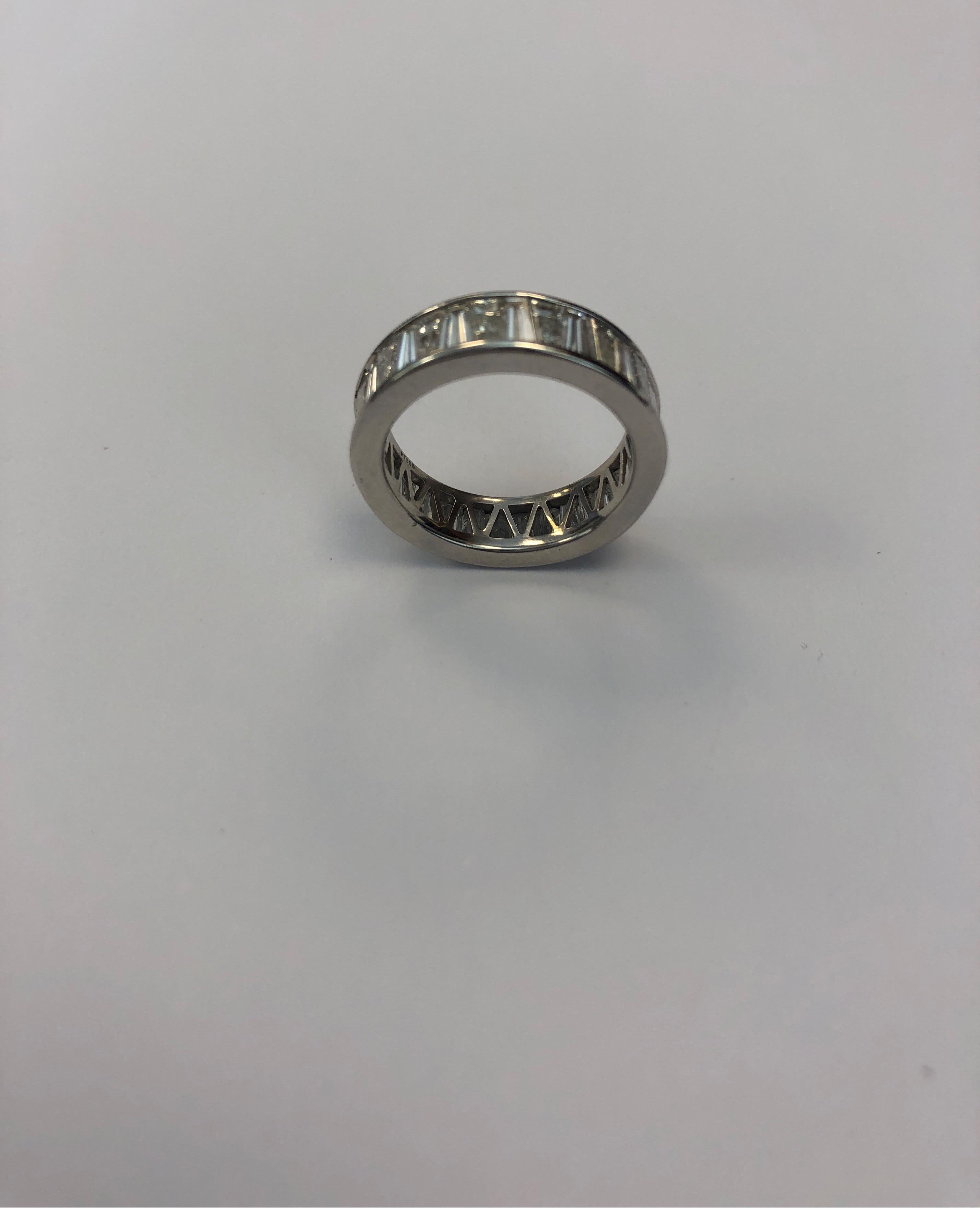 Platinum Tapered Baguette Channel Set Wedding/Eternity Band In Excellent Condition For Sale In Chicago, IL