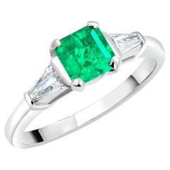 Platinum Tapered Baguette Diamond and Emerald Engagement Ring