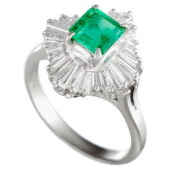 Platinum Tapered Baguette Diamond and Emerald Ring