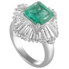 Platinum Tapered Baguette Diamond and Emerald Ring