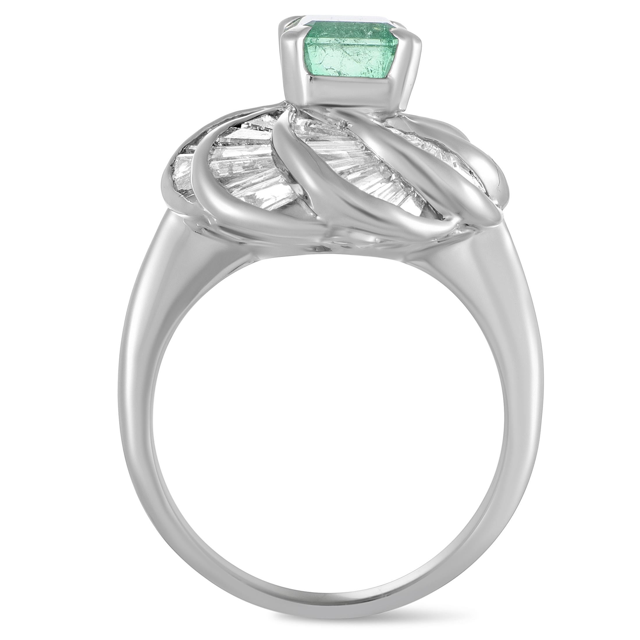 The resplendent diamonds that are beautifully set against the elegant platinum create a stunning backdrop for the expertly cut emerald in this spellbinding ring. The diamonds amount to 2.40 carats and the emerald weighs 1.28 carats.
Ring Top