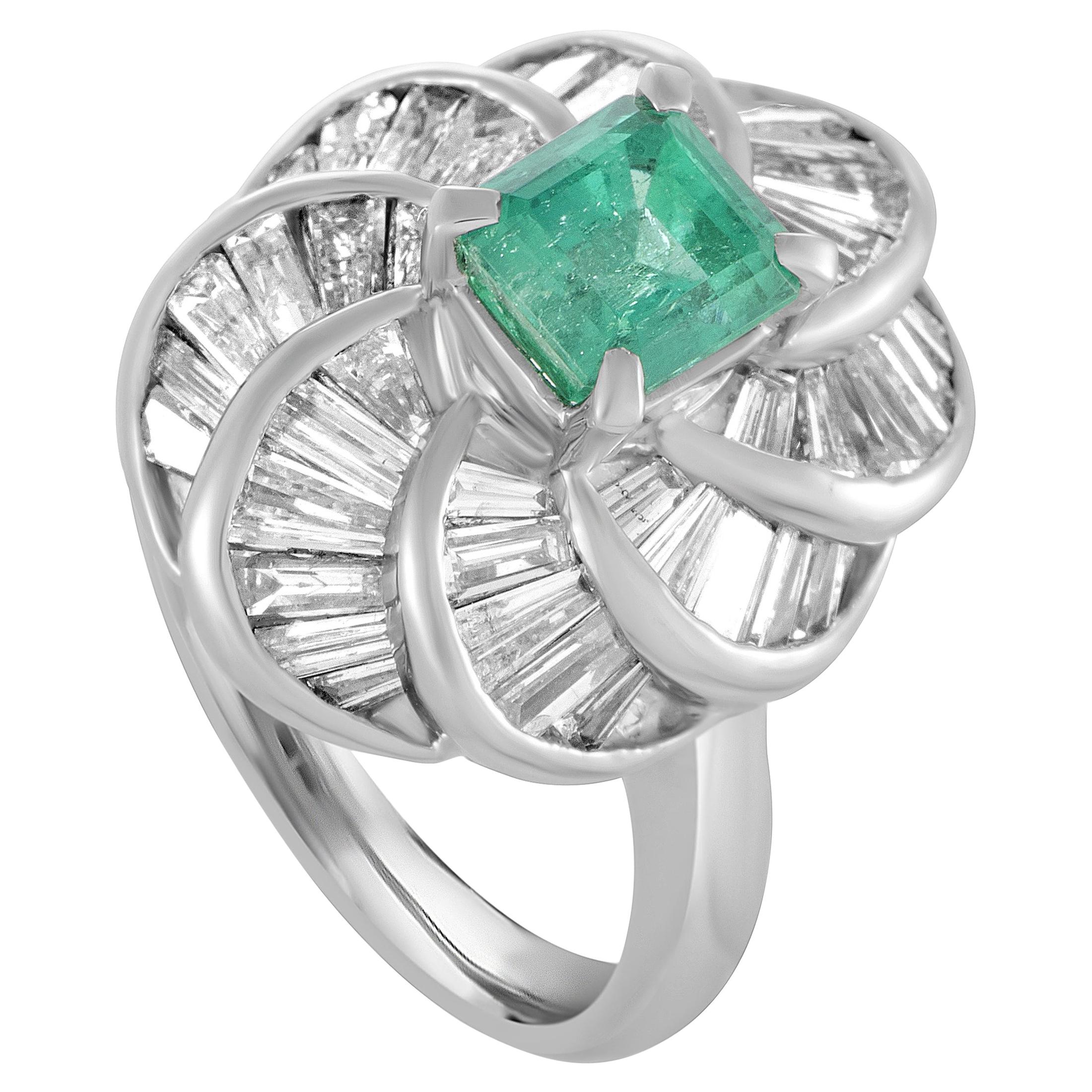 Platinum Tapered Baguette Diamonds and Emerald Oval Ring
