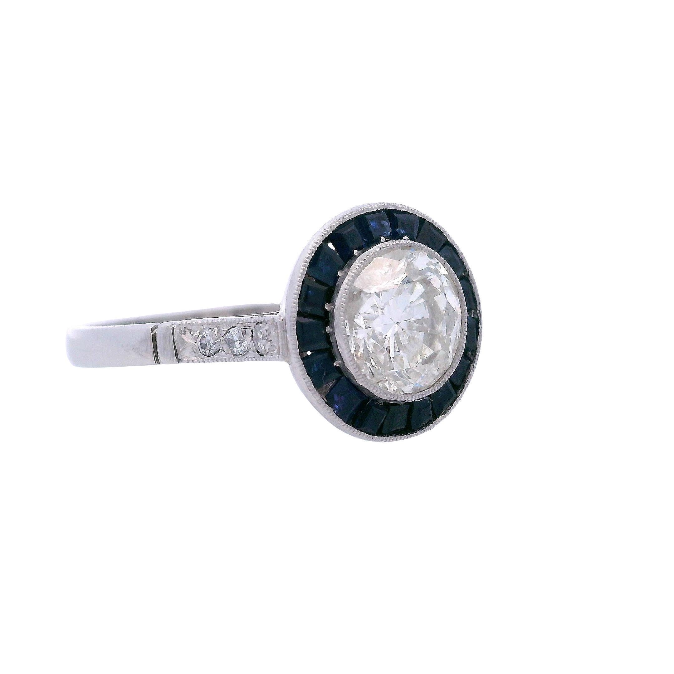Art Déco Platinum Target Ring with 1.26 Cts Diamonds and Sapphires in vendita
