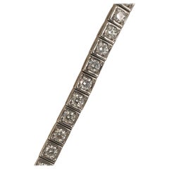 Platinum Tennis Bracelet with 37 Round Diamonds in a Square Bezel Setting