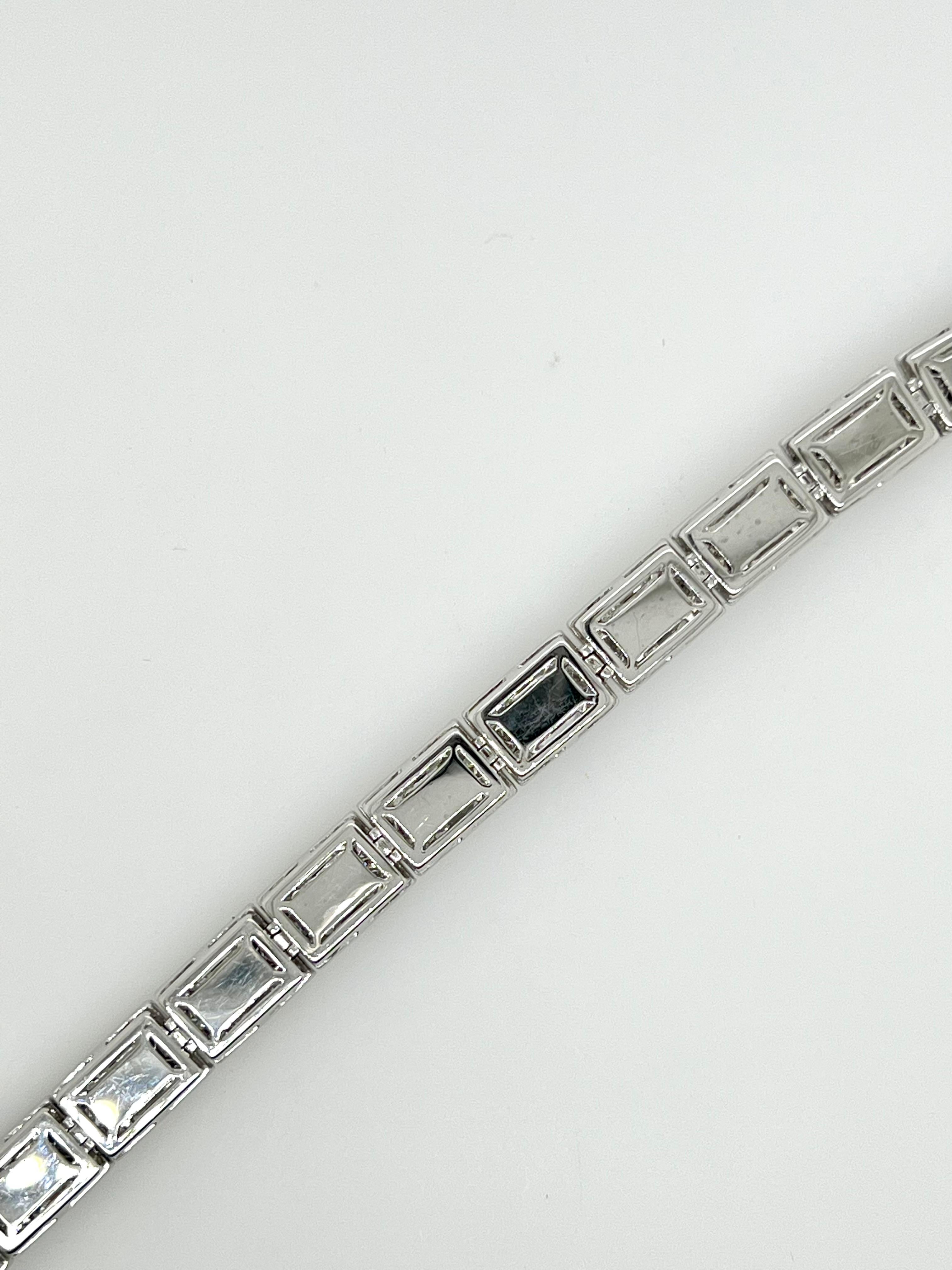 Contemporary Platinum Tennis Bracelet with Emerald Cut Sapphires & Diamond