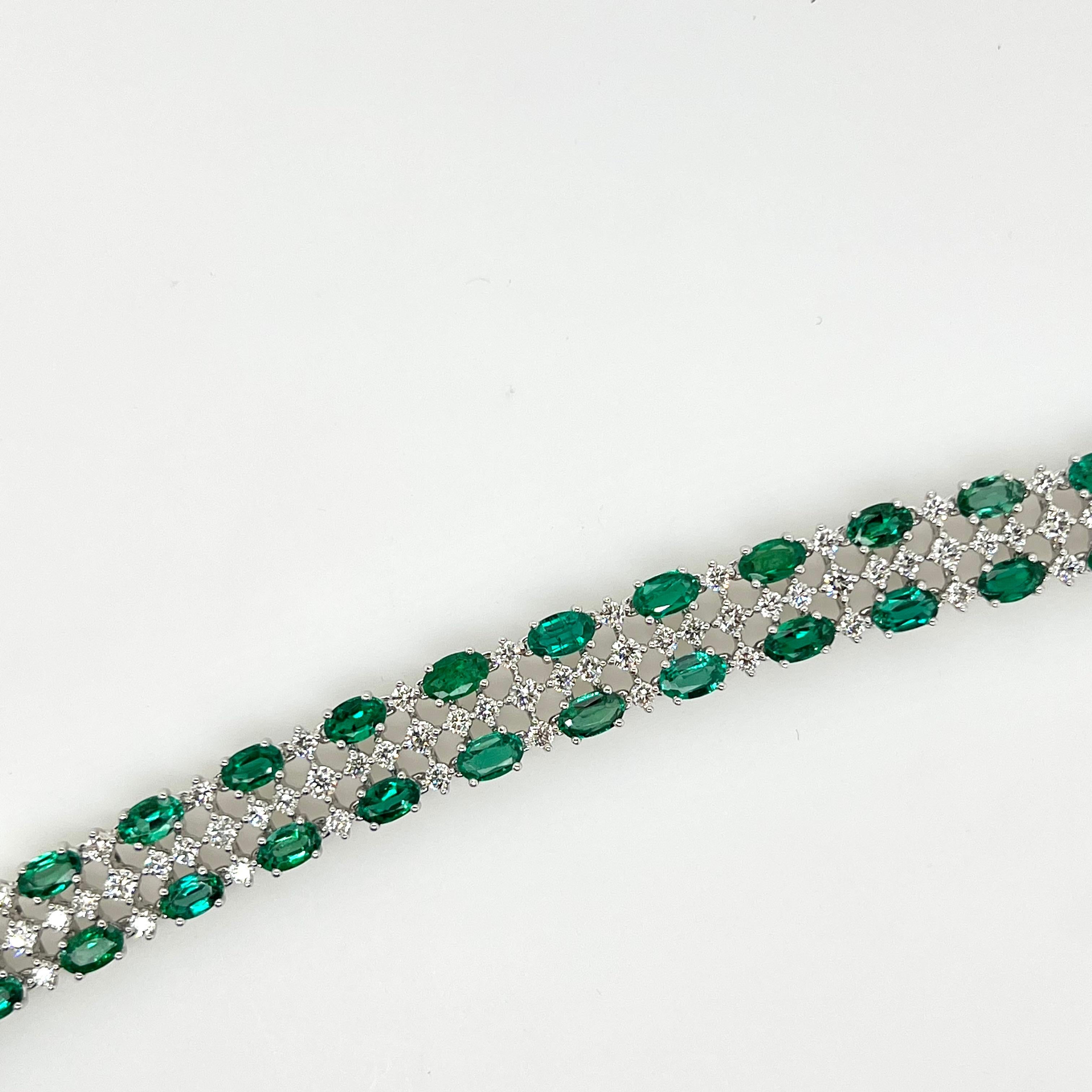 This elegant, handmade tennis bracelet in platinum is an art piece for the wrist.  The lush, vibrant oval emeralds are placed in a lattice-like field of round brilliant diamonds.  The quality of the emeralds are exceptional.

Emeralds:  8.67 cts,