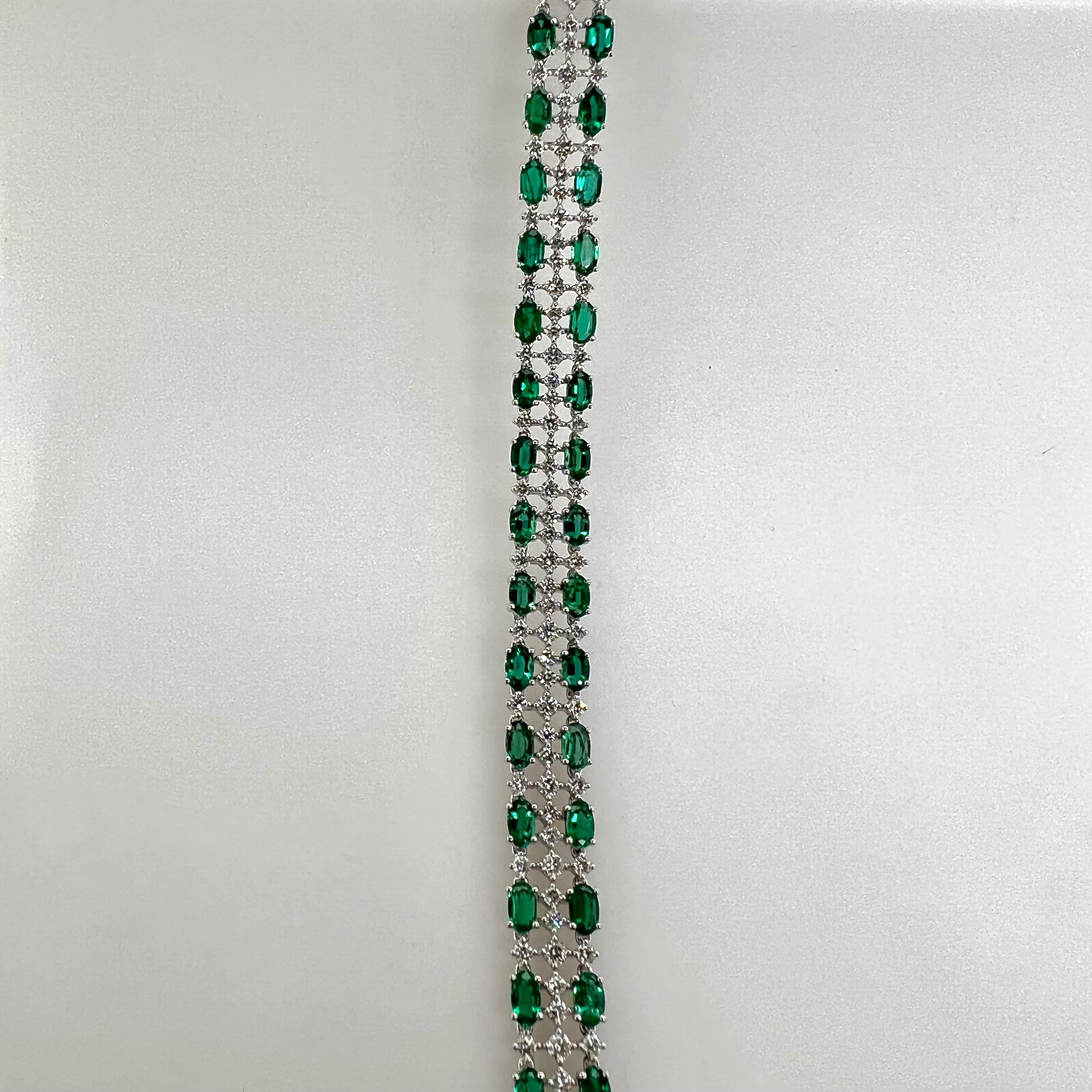 Platinum Tennis Bracelet with Oval Cut Emeralds and Diamonds In New Condition For Sale In Carrollton, TX