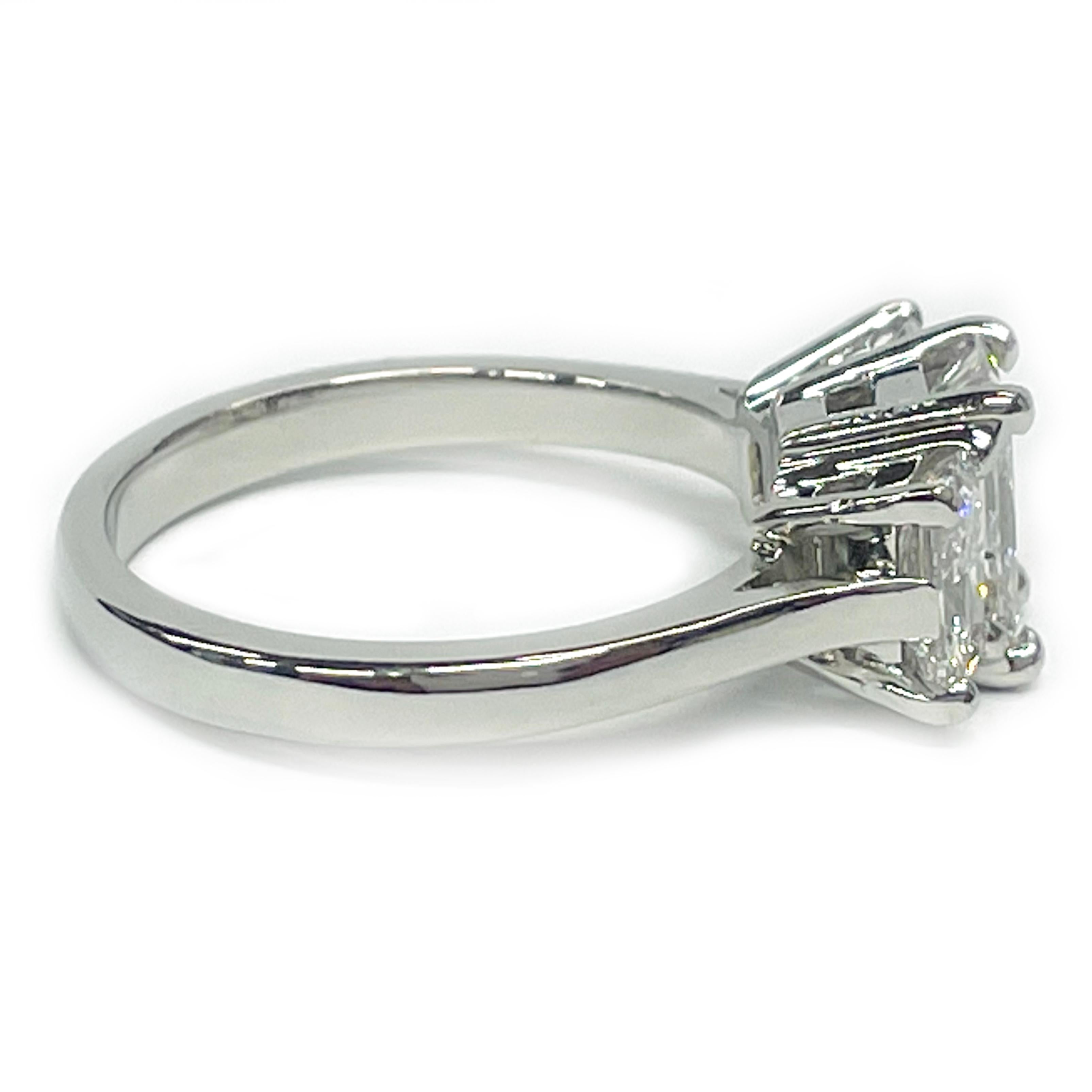 Platinum Three Diamond Ring, 1.92ctw. Simple and elegant three diamond ring design. All three diamonds are modified radiant-cut and set in four prong basket settings. The center diamond is larger measuring 7.45 x 4.91 x 3.47mm with a carat weight of