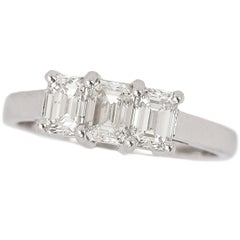 Platinum Three Stone 1.38ct Emerald Cut Diamond Engagement Ring