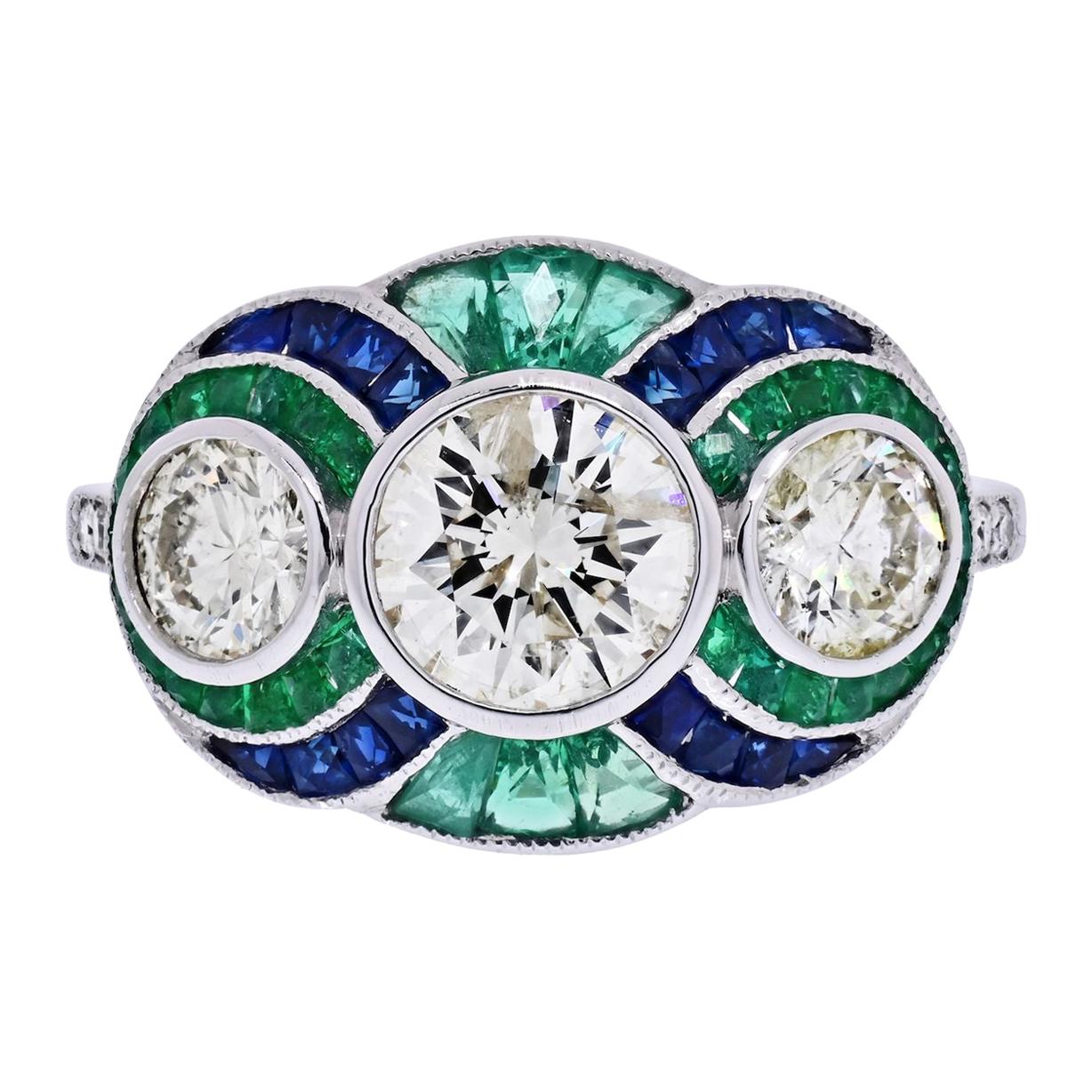 Platinum Three Stone Diamond, Emerald and Sapphire Three Stone Ring