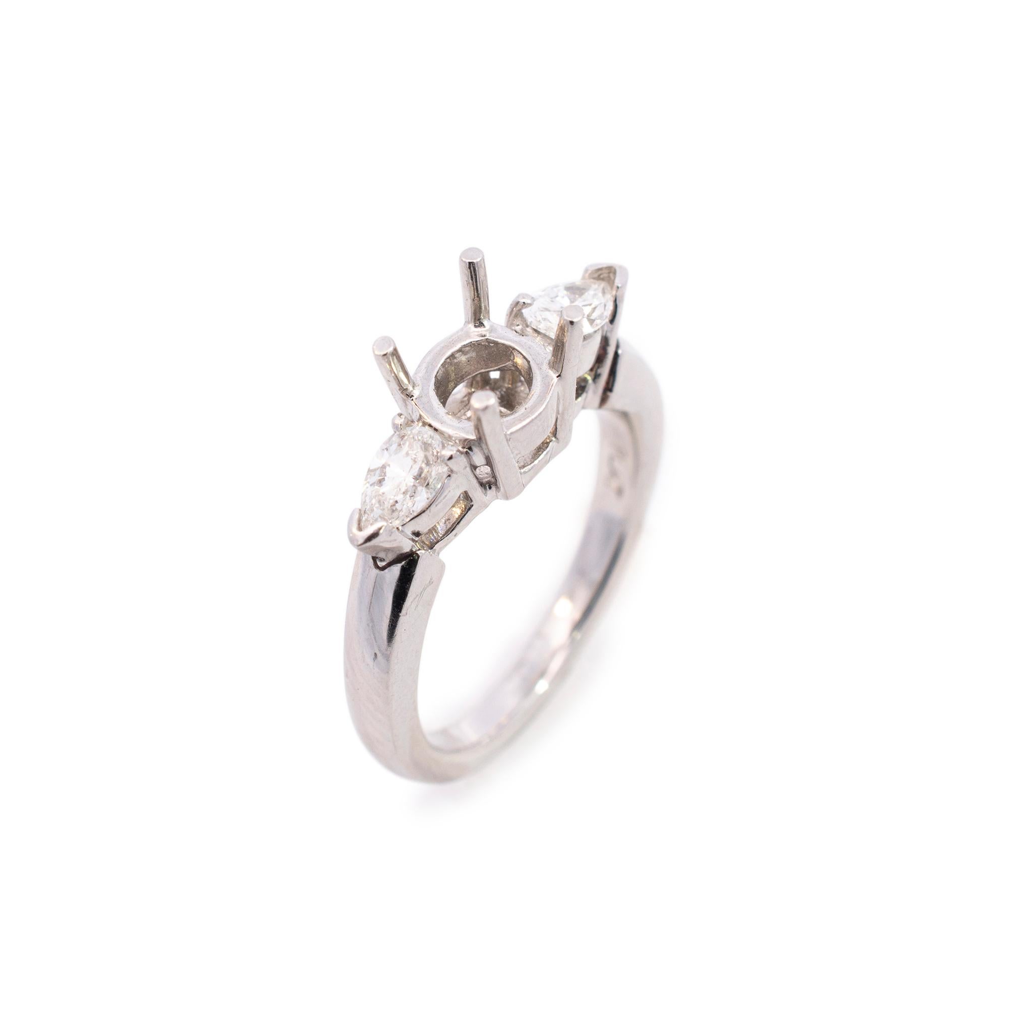 Gender: Ladies
Size: 6 US
Total Weight: 9 grams
Purity: Platinum
Shank type: Soft Square
Condition: Pre-owned in excellent condition. Quality and Durability was checked by professional jewelers.

The semi-mount can accommodate a round stone with a