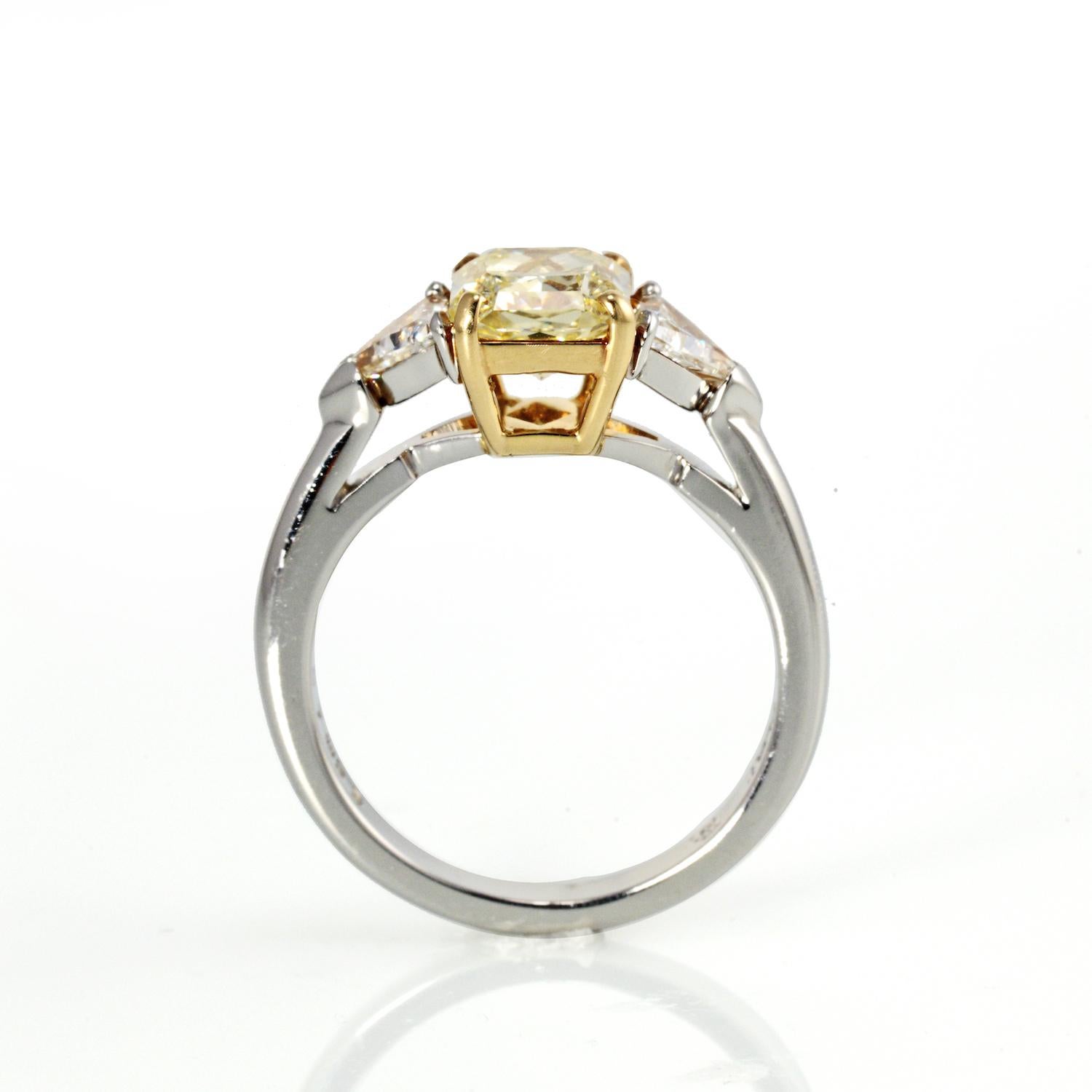 Modern Platinum Three-Stone Fancy Yellow Radiant Cut Diamond Engagement Ring