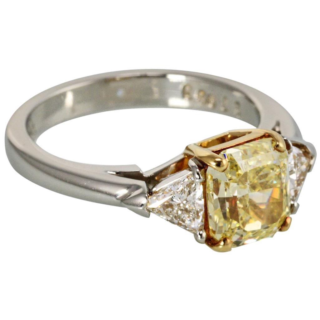 Platinum Three-Stone Fancy Yellow Radiant Cut Diamond Engagement Ring