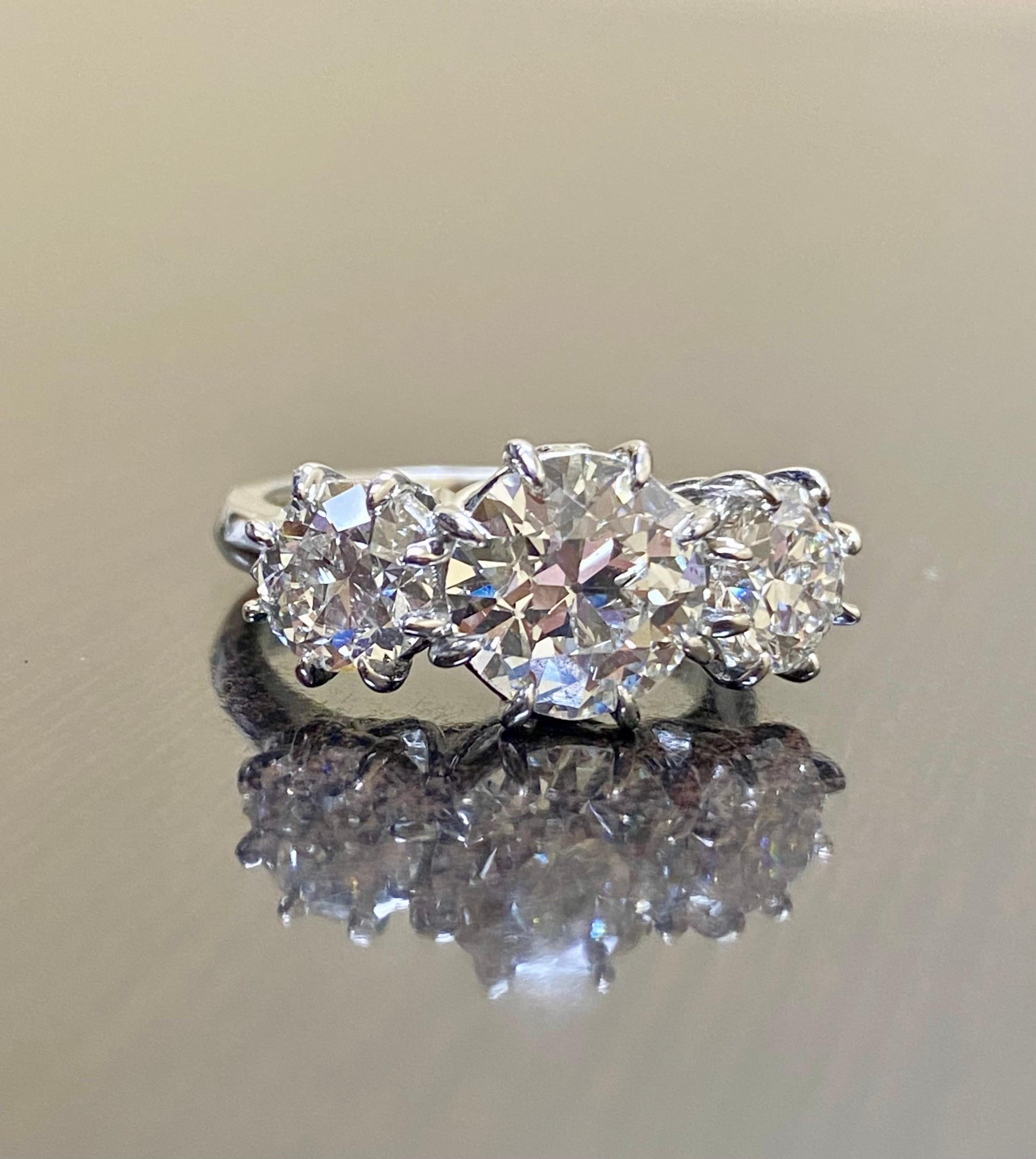 Platinum Three Stone GIA 4.28 Carat Old European Diamond Engagement Ring For Sale 4