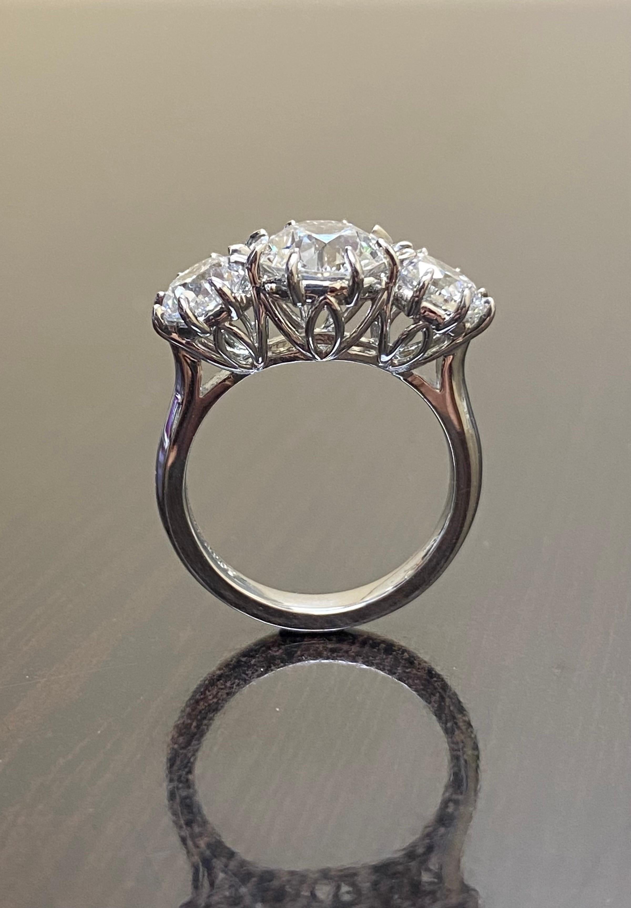 Art Deco Platinum Three Stone GIA 4.28 Carat Old European Diamond Engagement Ring For Sale