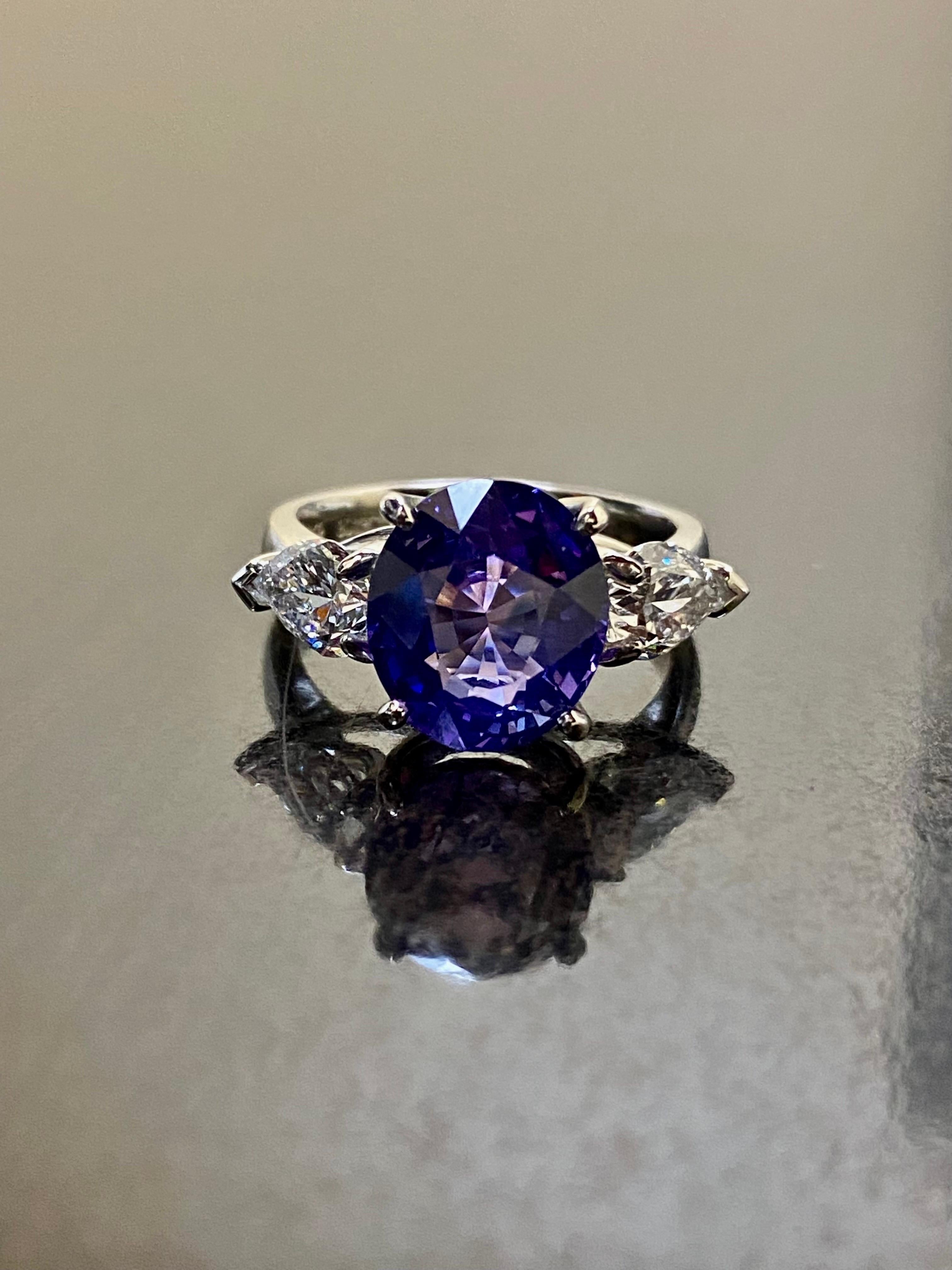 Platinum Three Stone GIA Certified 6.15 Carat No Heat Violet Sapphire Ring For Sale 1