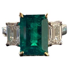 Platinum Three Stone GIA Emerald Cut Diamond Colombian Emerald Engagement Ring