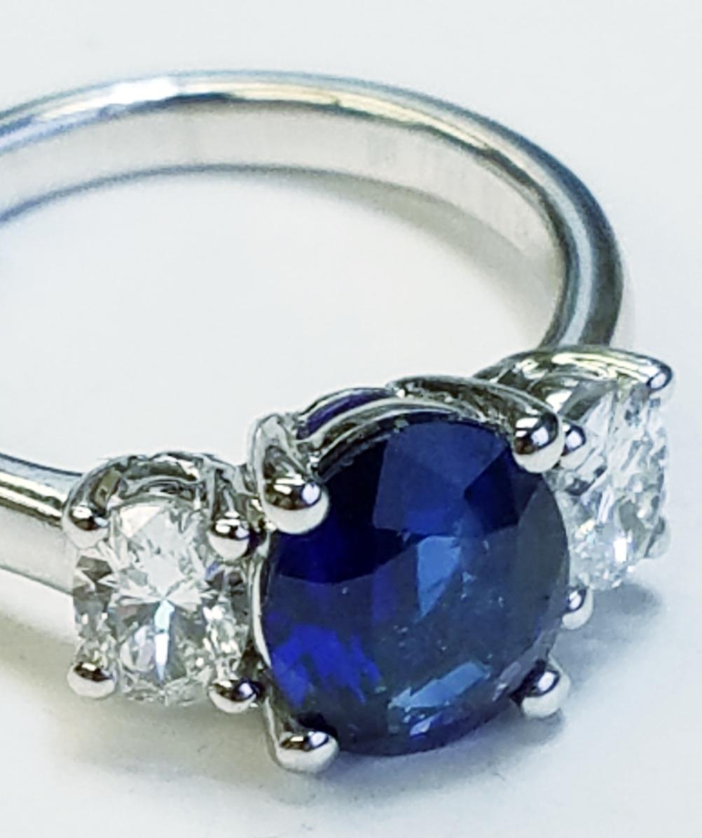  Three Stone Oval Cut Blue Sapphire and Diamond Ring
2.28 carats of Blue Sapphires
0.77 carats of Diamonds
Oval Cut

