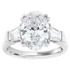 GIA Certified 3.62 Carat Oval & Tapered Baguette Diamond Platinum Ring 