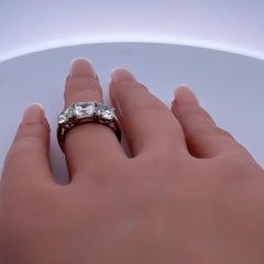 Platinum Three-Stone Ring with 4.44 Carat Round & Asscher Diamonds Size 5.25 GIA