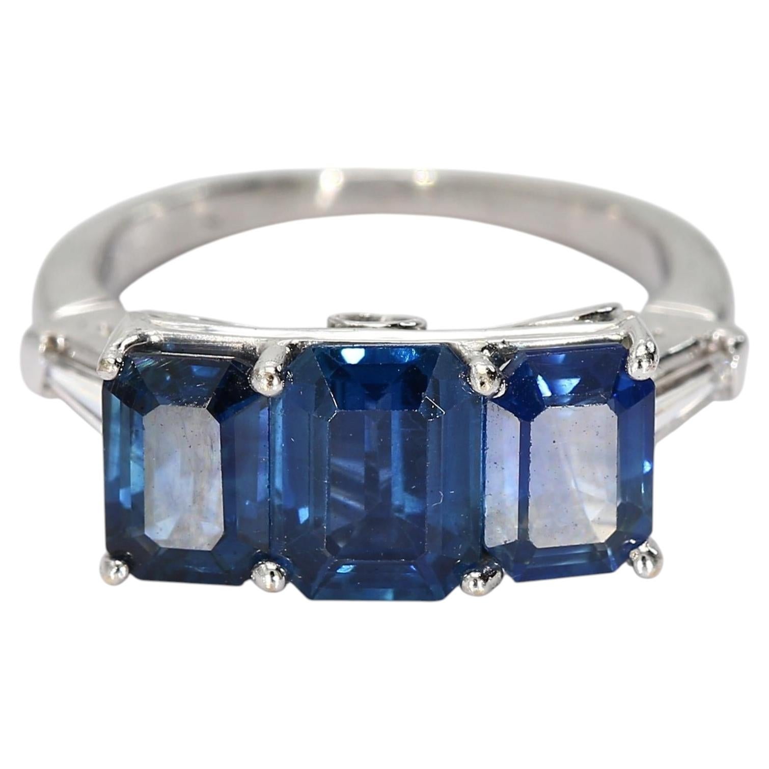 Platinum Three Stone Ring with Blue Emerald Cut Sapphire & Diamonds - Size 5.75