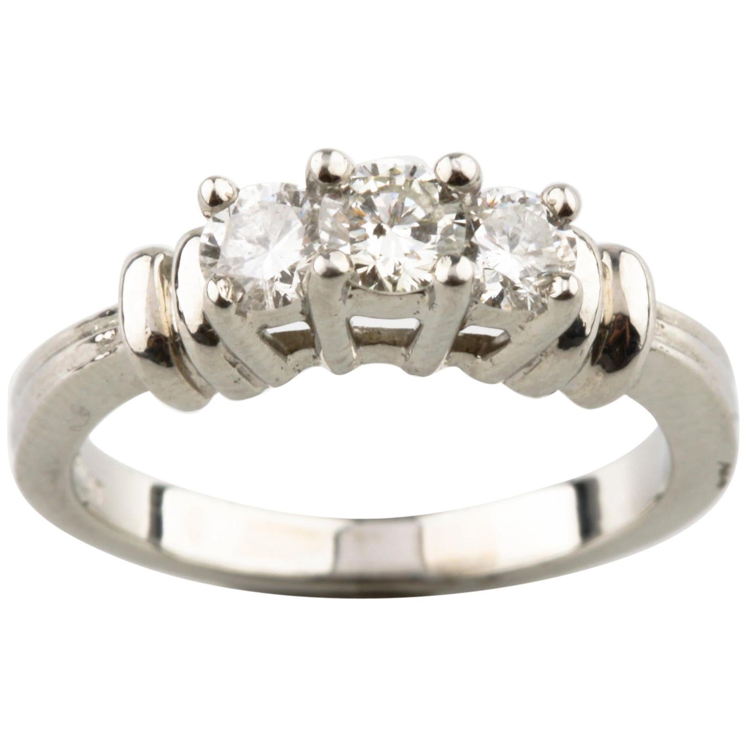 Platinum Three-Stone Round Diamond Ring TDW 0.40 Carat For Sale