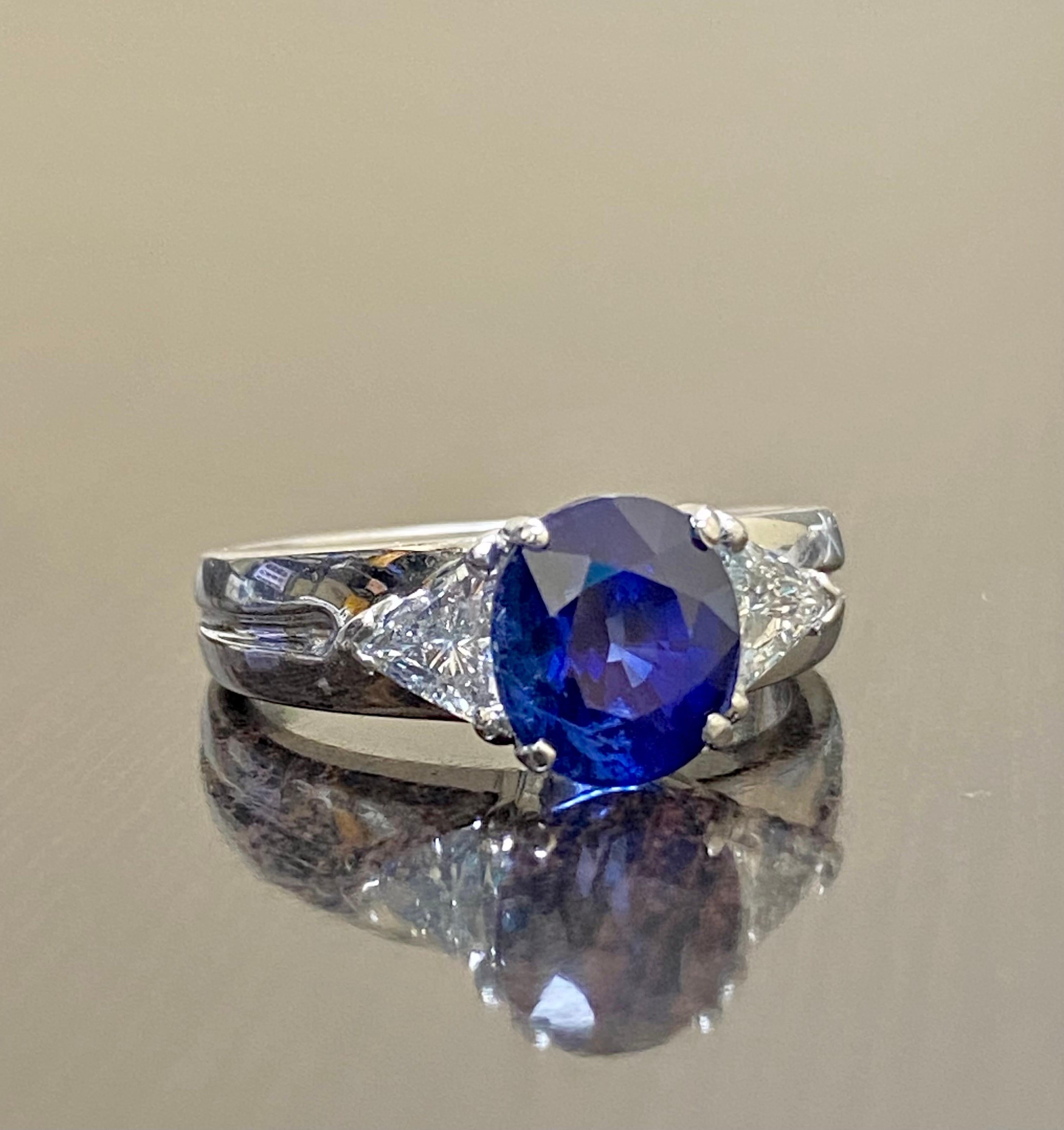 Platinum Three Stone Trillion Diamond 4.10 Carat Blue Sapphire Engagement Ring For Sale 5