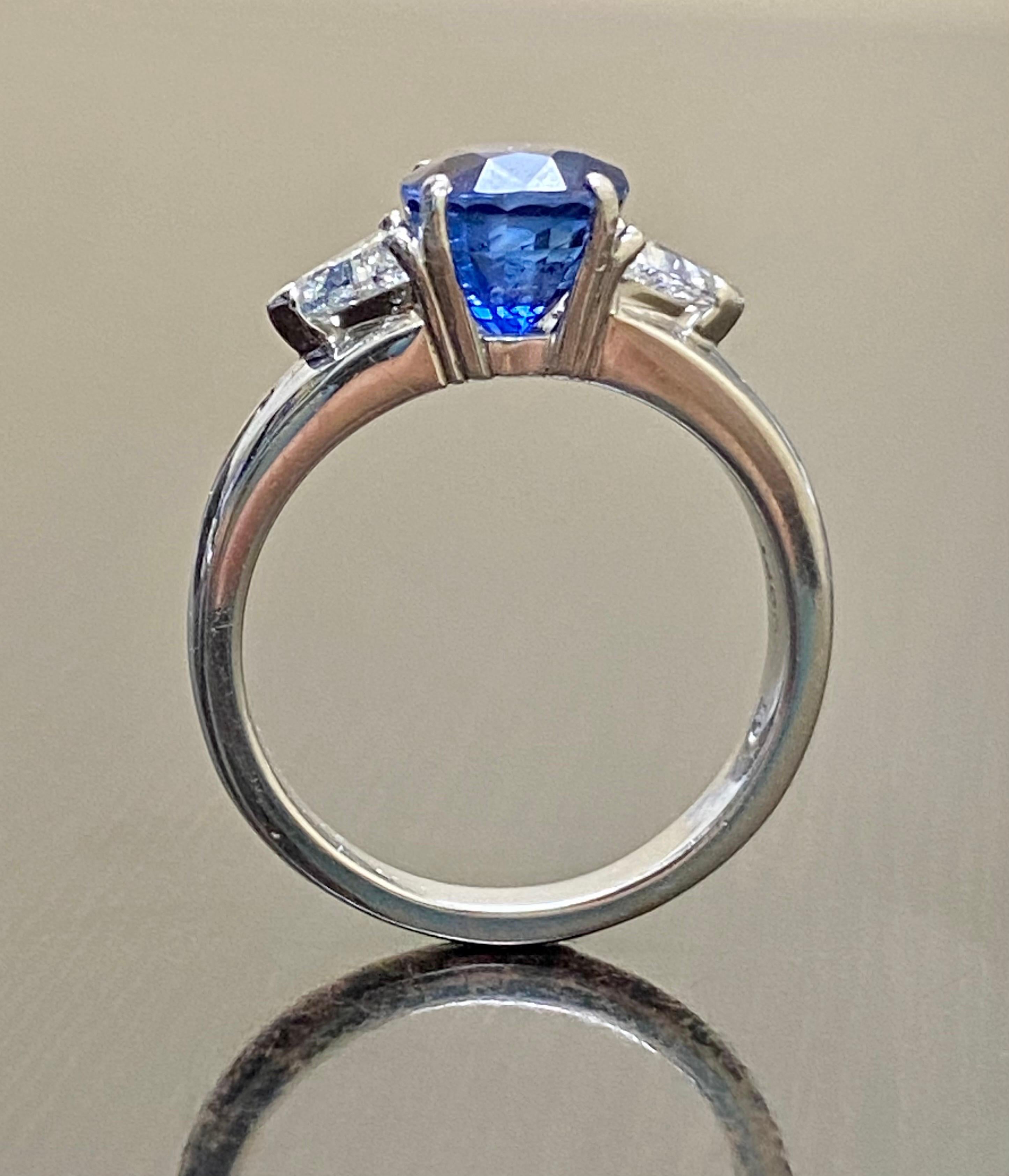 Platinum Three Stone Trillion Diamond 4.10 Carat Blue Sapphire Engagement Ring For Sale 3