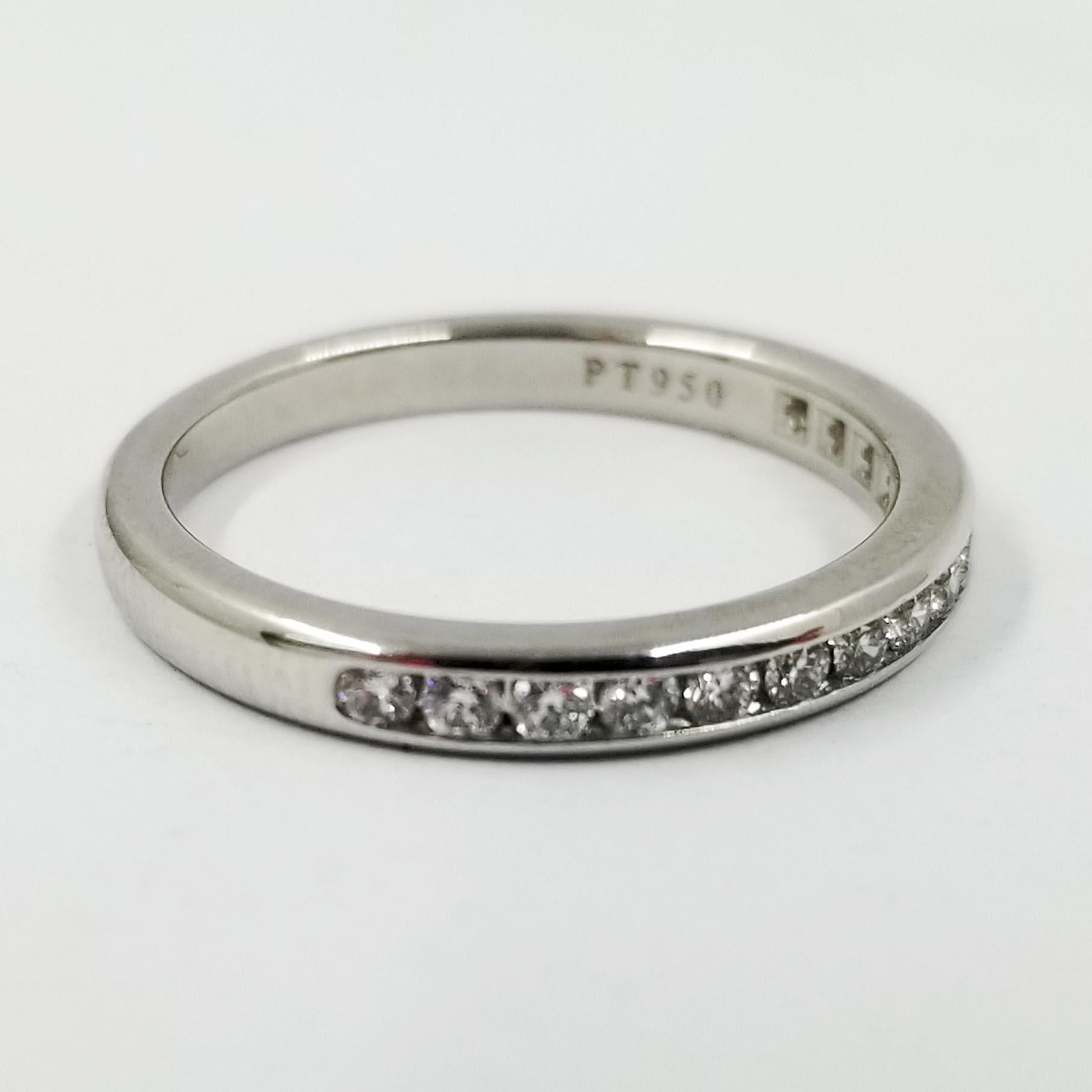 Platinum Tiffany & Co. Channel Set Round Diamond Band Ring In Excellent Condition For Sale In Coral Gables, FL