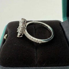 Platinum Tiffany & Co. Victoria Ring Showcasing a Mixed-Cut Diamond Cluster
