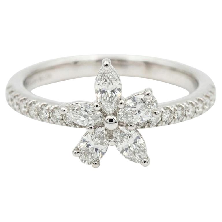 Platinum Tiffany & Co. Victoria Ring Showcasing a Mixed-Cut Diamond Cluster