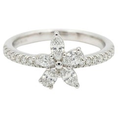 Platinum Tiffany & Co. Victoria Ring Showcasing a Mixed-Cut Diamond Cluster