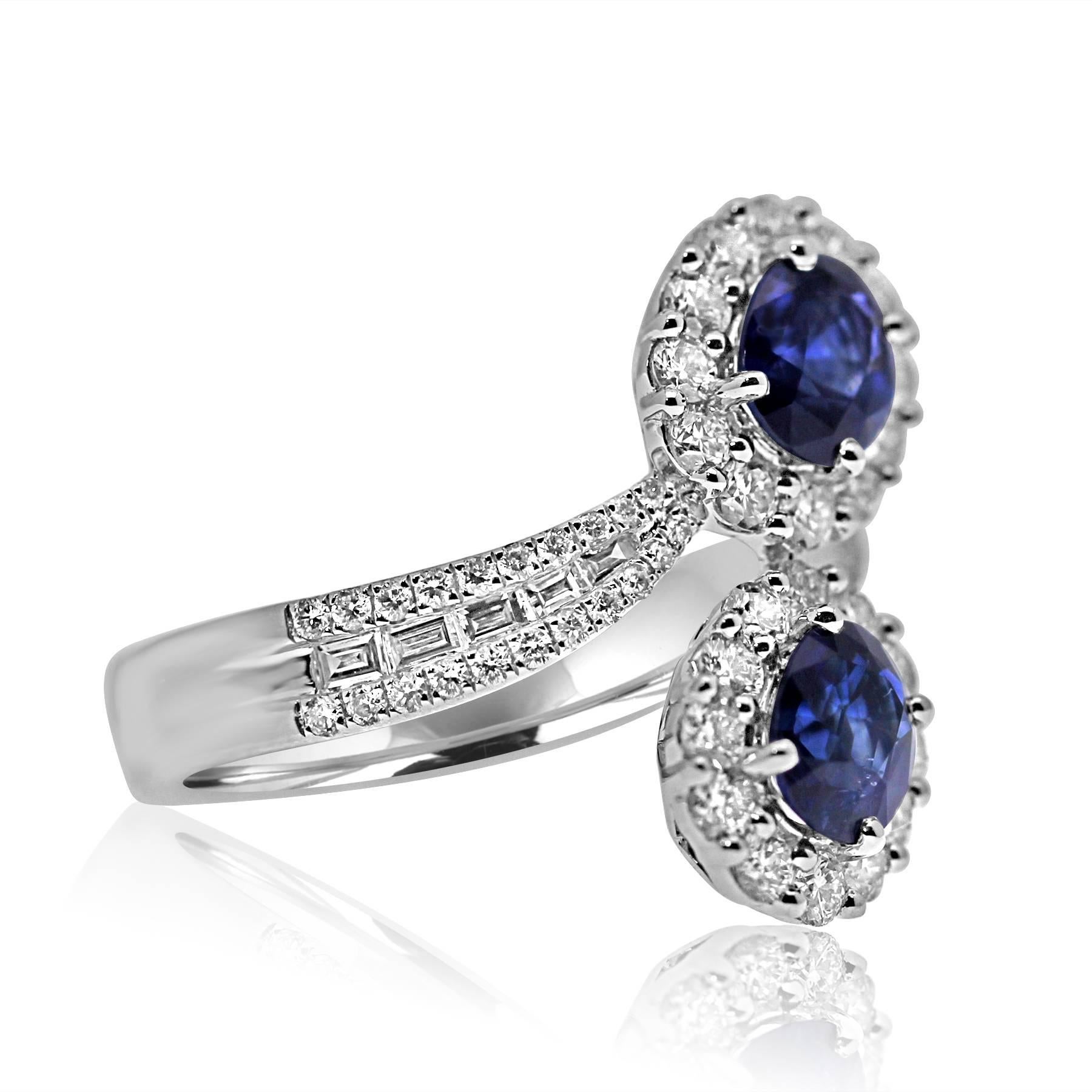 platinum  ring featuring two blue sapphires gemstones of 1.78ct total in a design called toi-et-moi which means me and you together forever.
surrounded by degraded brilliant and baguette cut diamonds of 1.15ct total to give an extra sparkly finish