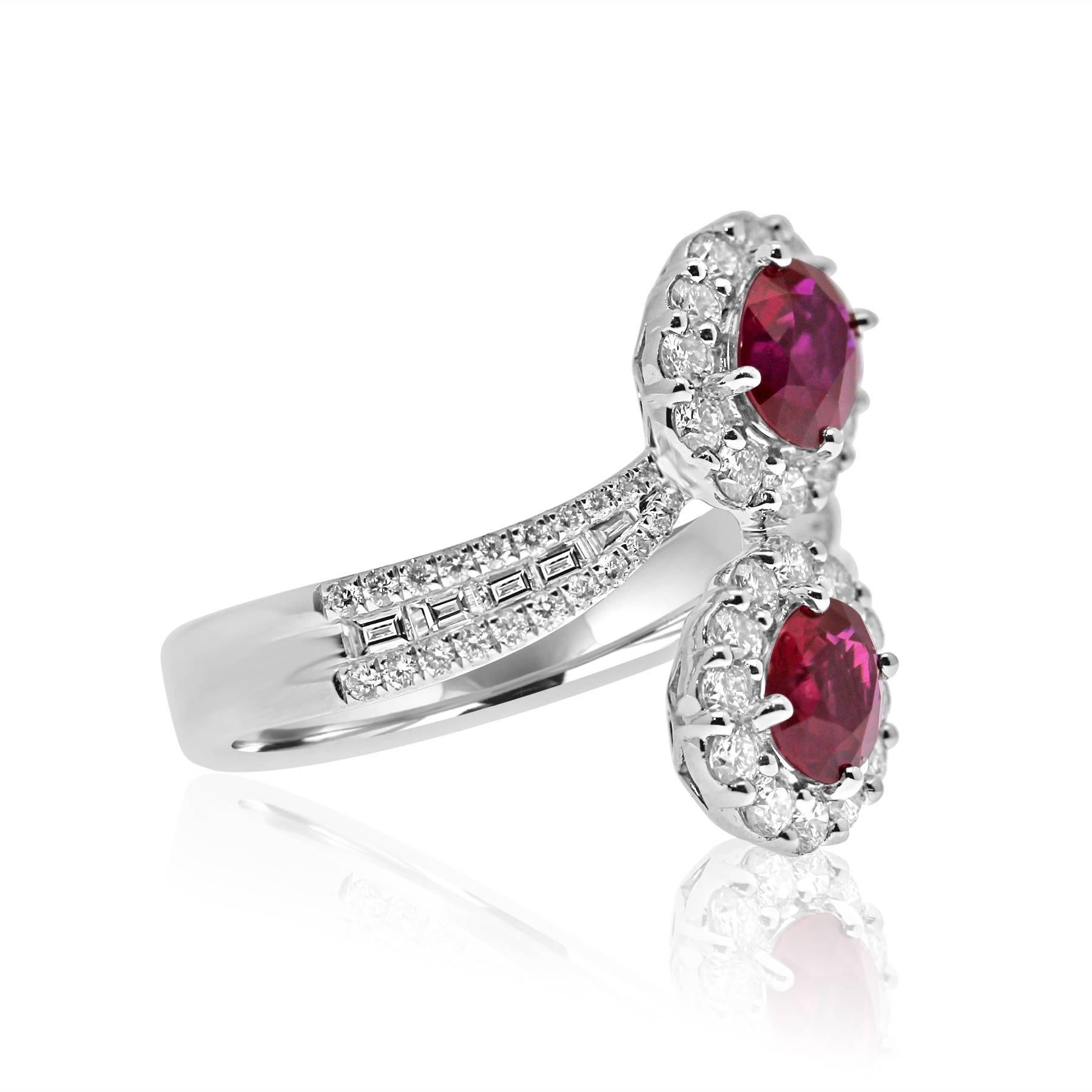 platinum  ring featuring two rubies gemstones of 1.62ct total in a design called toi-et-moi which means me and you together forever.
surrounded by degraded brilliant and baguette cut diamonds of 1.05ct total to give an extra sparkly finish like only